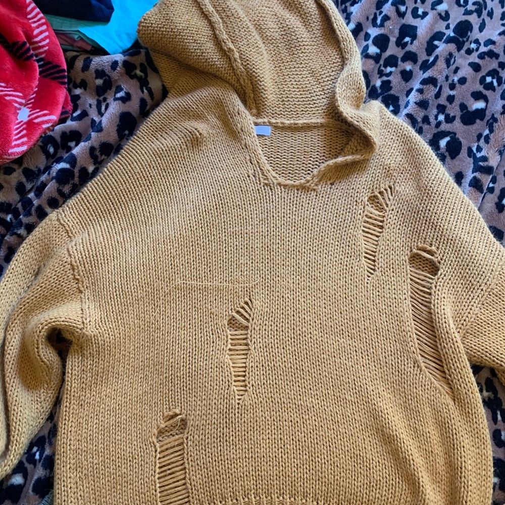 knitted sweater, keeps u warm, comfy, not itchy